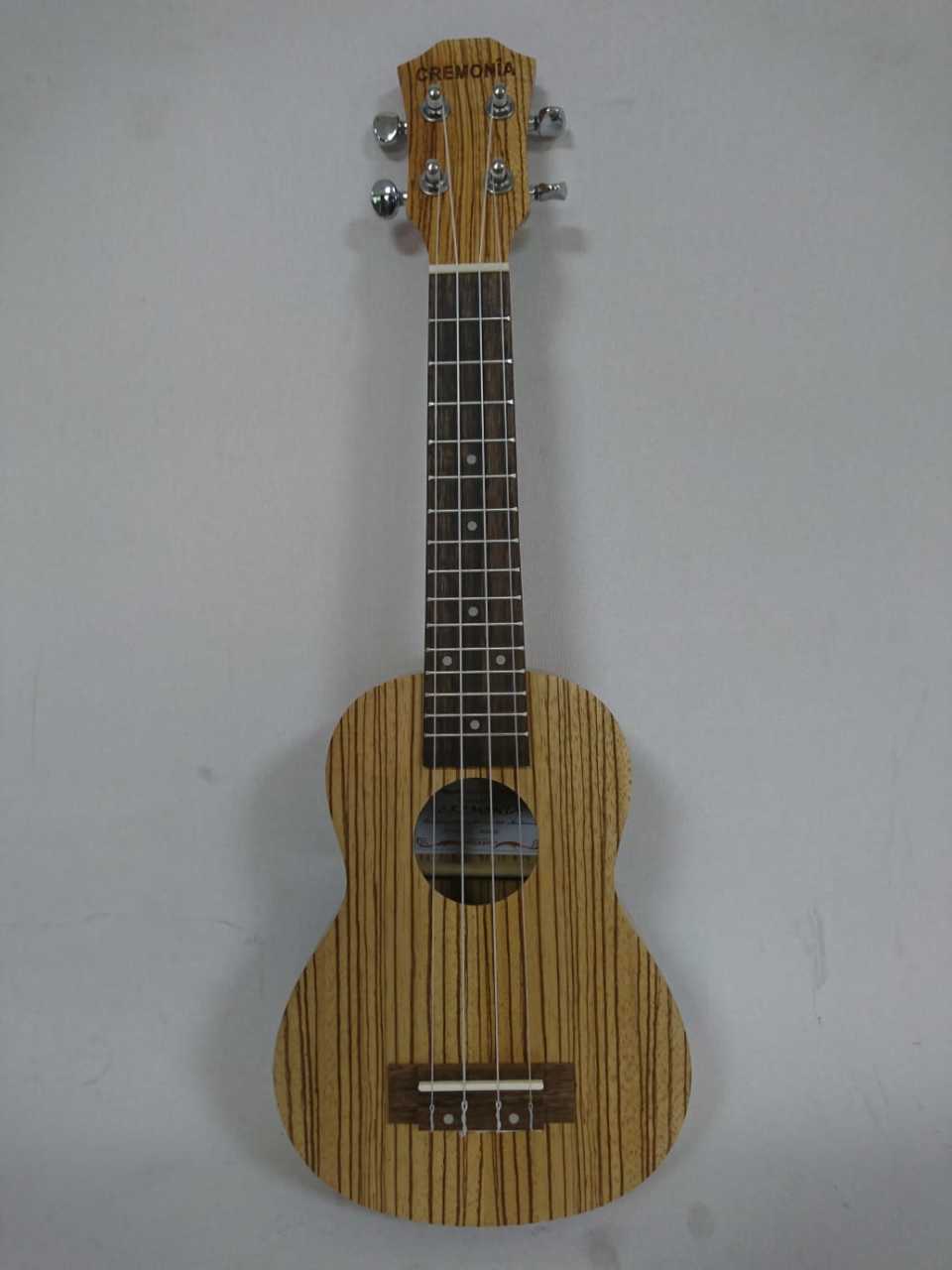 UKULELE 23'' KONSER TİP KASA, KILIFLI, ZEBRAWOOD, MAT FİNİŞ, SAP: MAUN, KLAVYE: SİYAH CEVİZ, BURGULAR: KALİTELİ KALIP DÖKÜM